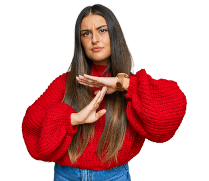 Beautiful hispanic woman wearing casual clothes doing time out gesture with hands, frustrated and serious face