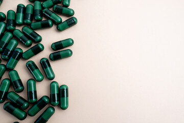 Pills close-up on a color background. Taking vitamins or medications. Concept of healthcare, medicine, pharmacy, disease prevention