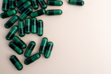 Pills close-up on a color background. Taking vitamins or medications. Concept of healthcare, medicine, pharmacy, disease prevention