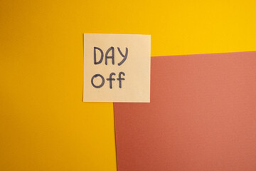 Day off - workplace message in the office. Concept of absence from work and day off