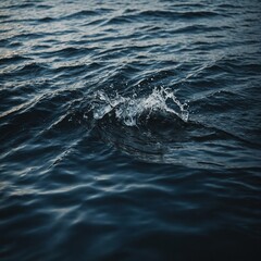 Obraz premium Majestic waterfall cascading into a clear turquoise pool, surrounded by lush tropical vegetation