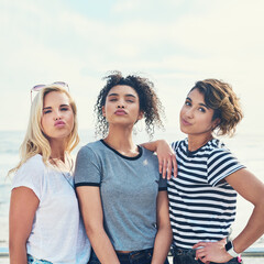 Obraz premium Beach, girls and friends on portrait for fashion with edgy or streetwear style in Spain. People, women and confident on summer outfit on break or holiday to relax, chill and bonding for support