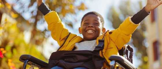A joyful child in a wheelchair raises their arms in triumph, embracing a sunny day, symbolizing freedom and happiness.