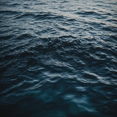 The fresh, sparkling surface of a mountain stream flowing through a picturesque forest
