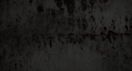 Obraz premium Black background made of real, shiny black paper covered with foil, illuminated by a soft light from above. 