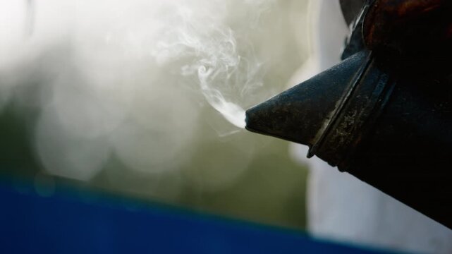 Close-up of a tool used in artisanal crafting near a river in the woods during early morning