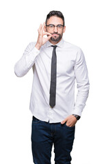 Young handsome business man wearing glasses over isolated background mouth and lips shut as zip with fingers. Secret and silent, taboo talking