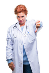 Senior caucasian doctor woman wearing medical uniform over isolated background looking unhappy and angry showing rejection and negative with thumbs down gesture. Bad expression.