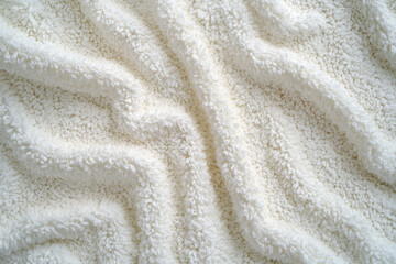 This terrycloth texture background is characterized by its distinct looped fabric, offering a comfortable, textured feel that is highly absorbent and reminiscent of bath towels and robes