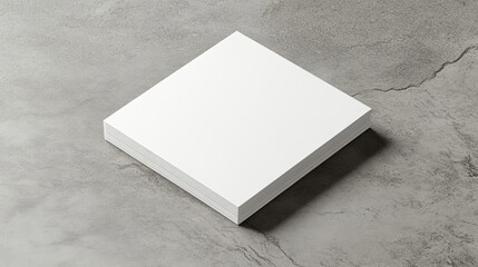Fototapeta premium Stack of textured business cards on a grey concrete background