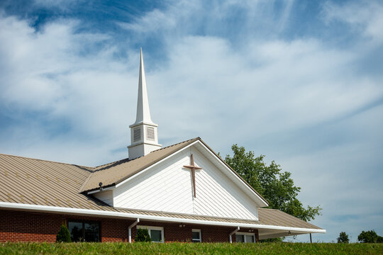 a traditional church with a steeple
