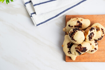 Kue Cubit. Indonesian version of Dutch poffertjes; topped with chocolate sprinkles. Perfect for design element, product packaging, promotion, or any commercial purposes.