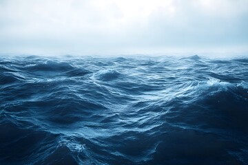Ocean waves crashing against a rocky coast, white foam and blue water under a dramatic sky