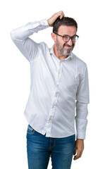 Fototapeta premium Handsome middle age elegant senior business man wearing glasses over isolated background confuse and wonder about question. Uncertain with doubt, thinking with hand on head. Pensive concept.