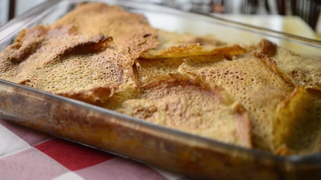 Close-up video pan of Timballo: layers of crepes, artichokes, meat, cheese, B&eacute;chamel sauce, from Abruzzo, Italy.