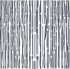 Vertical dry branches or sticks accumulate into a common pile or covering.