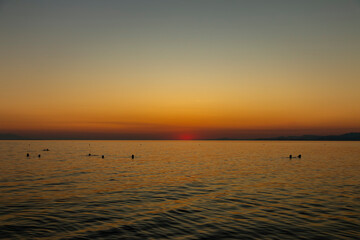 Beautiful sunset and calm weather on the sea