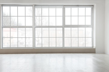 View of empty room with laminate floor and window