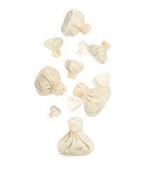 Delicious khinkali (Georgian dumplings) falling on white background