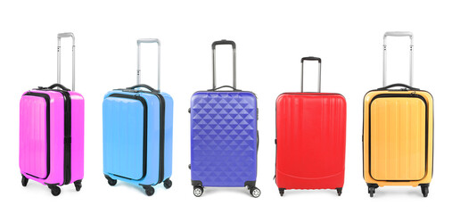 Stylish colorful suitcases on white background, set