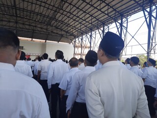 portrait of a flag ceremony person in a white uniform in Indonesia