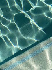 Water in swimming pool with aesthetic tiles