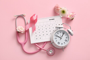 Composition with calendar, pink ribbon, stethoscope and flowers on color background. Breast cancer awareness concept