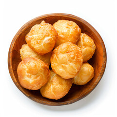 a bowl of puff pastry on a white surface
