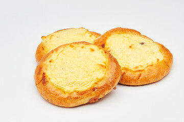 Freshly baked cheese-filled pastries with golden crusts, perfect for breakfast or a sweet treat