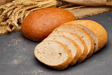 Sliced round loaf of freshly baked bread, perfect for breakfast or sandwich making