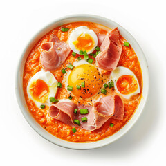 a bowl of soup with ham eggs and green onions