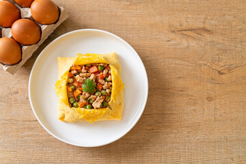 egg wrap or stuffed egg with minced pork and vegetable