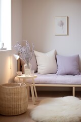 A cozy living room corner with a white couch, a fluffy rug, a wicker basket, and a side table with a vase of dried flowers.