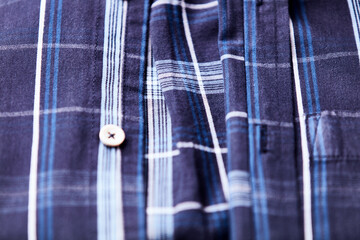 Close up of Men's checkered shirt.	