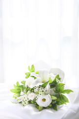 floral background with white color bouquet on a table