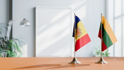 FLAGS OF ANDORRA AND LITHUANIA  ON TABLE