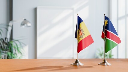 FLAGS OF ANDORRA AND NAMIBIA  ON TABLE