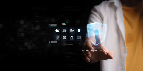 Man using thumb to scan finger print or for digital processing biometric identification to access...