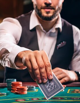 Un elegante crupier, repartiendo cartas en un casino; juegos y apuestas