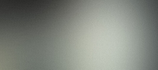 Abstract light grey background with fine grain texture showing gradient from dark to light
