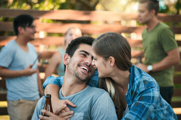 Couple, barbecue and backyard with hug, love and labor day event with celebration and drinks...