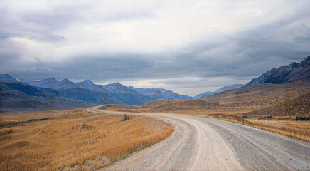 A road winds its way through a wilderness landscape setting. With copy space.