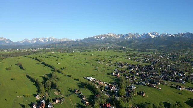 Aerial view of the picturesque outskirts of Zakopane and the Tatra Mountains in summer, Poland