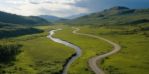 Fototapeta premium A road winds its way through a wilderness landscape setting. With copy space.