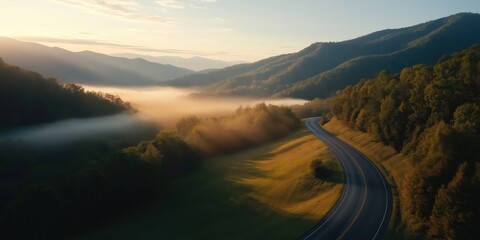 A road winding its way through the beautiful landscape of the Great Smokey Mountains. With copy space.