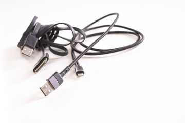 two rolls of cell phone cable on a white background