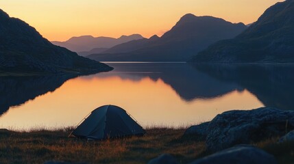 A beautiful view of a tent pitched by a calm lake, with mountains reflected on the water surface at sunrise