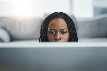 Business, black woman and online with computer in office for reading email, spreadsheets and...