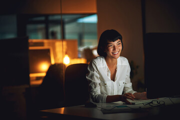 Business, woman and happy at night in office for report deadline, assignment and press release...