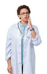 Young african american doctor woman wearing medical coat over isolated background touching mouth with hand with painful expression because of toothache or dental illness on teeth. Dentist concept.